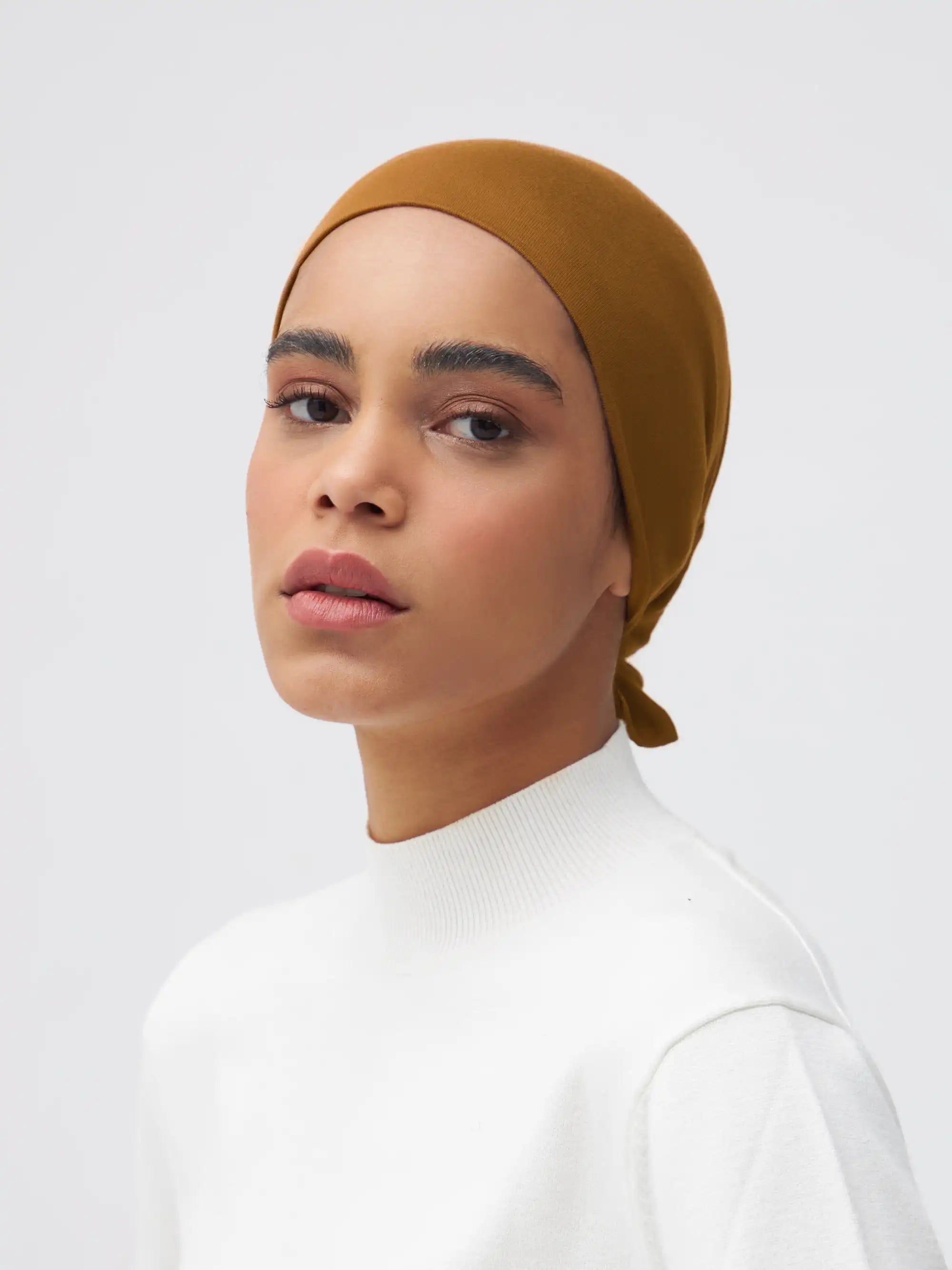 Tie Back Bone - Bronze