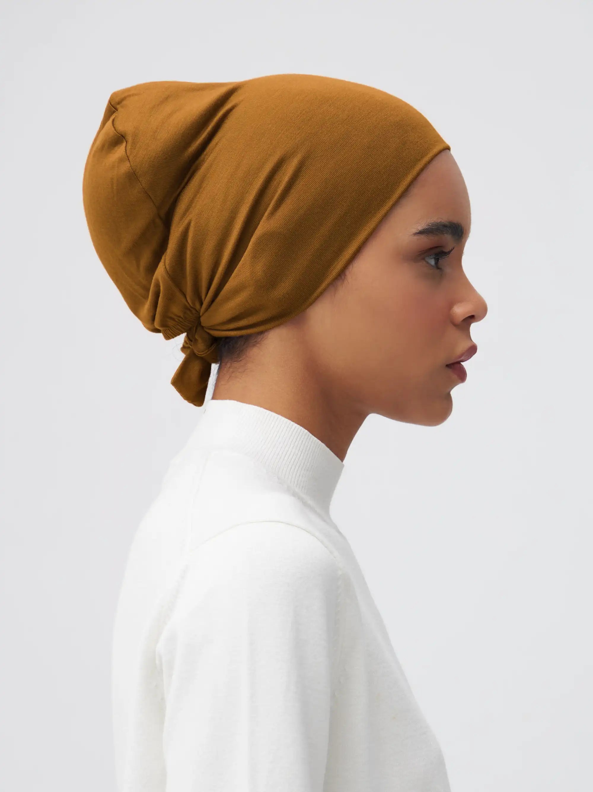 Tie Back Bone - Bronze